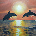 Dolphins at Sunset